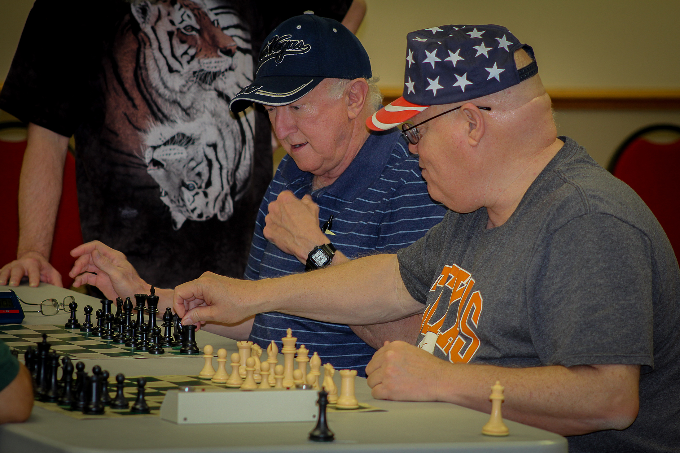 The previously unbeaten team of Tubbs–Hollingsworth continue a tradition established at the 1986 Lawton City Chess Championship; Turning the Knights so their rears face the Opponent.  Photo by Sheryl McBroom.